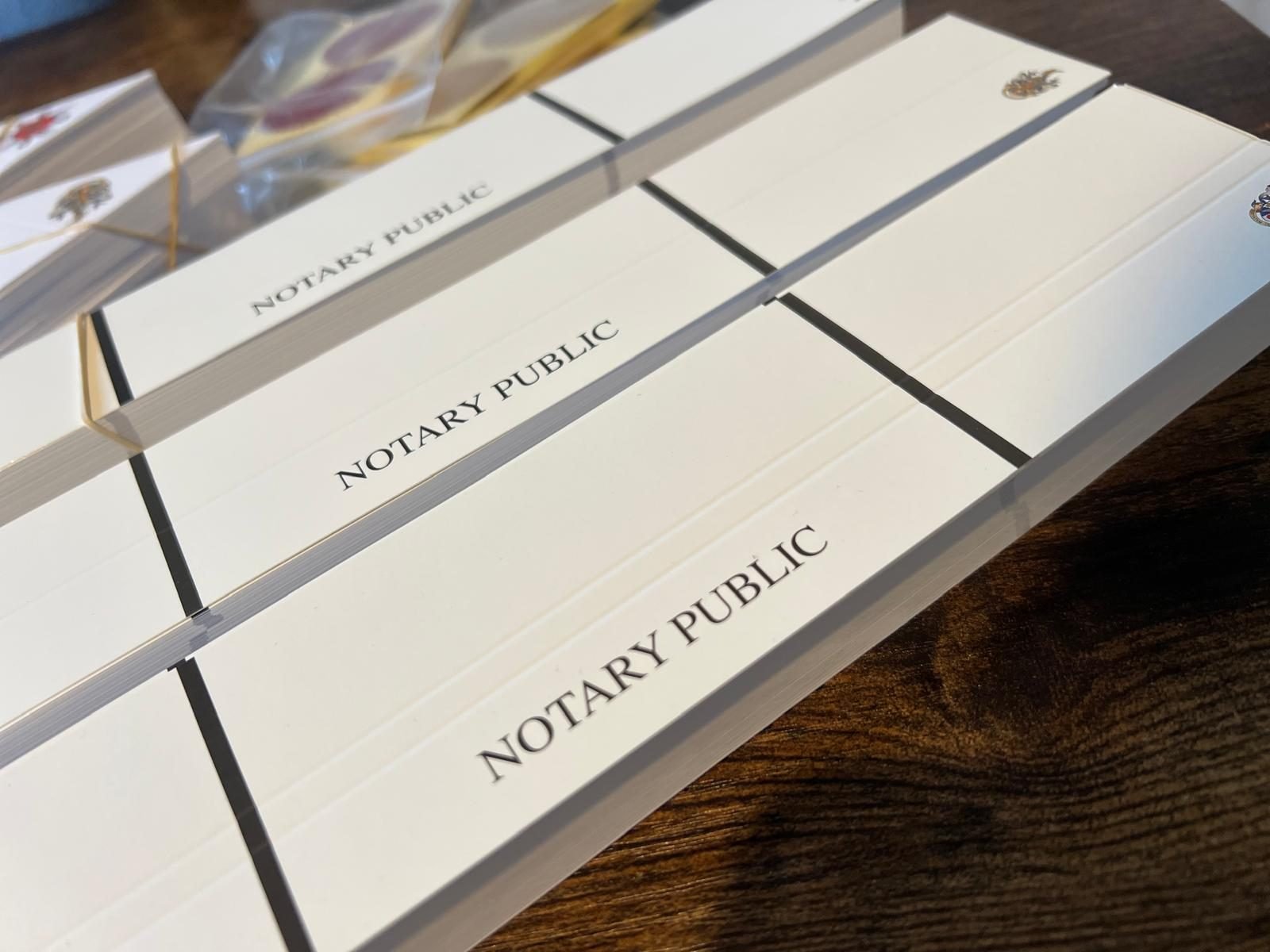 Notarial documents bound with ribbon and sealed, ready to be sent